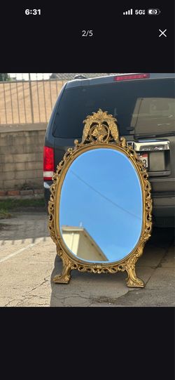 Gilded big mirror