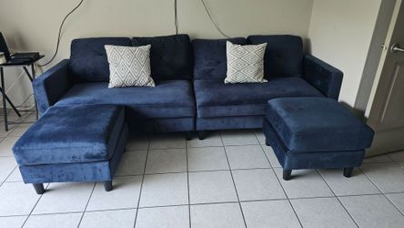 Blue 4 seat couch with foot rest