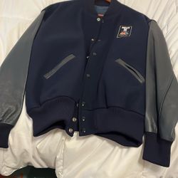 A large letterman jacket from Telemundo and Olympics because you know the Olympics is coming up. This is a good offer.