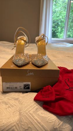 Christian Louboutin - red bottoms