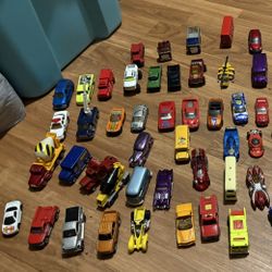 (76 Pieces) Randomly Assorted Collection Of Die-cast Metal Cars.