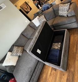 Sectional with storage ottoman
