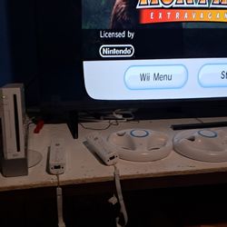 A Wee Two Nunchucks Two Controllers Two Steering Wheels And 19 Games