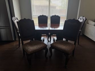 Mesa de comedor de madera con 8 sillas