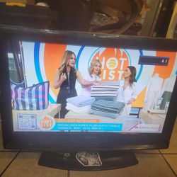 26" Sylvania tv, works well, slight shading on borders, stand remote