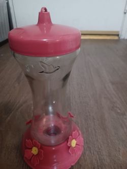 Red hummingbird feeder