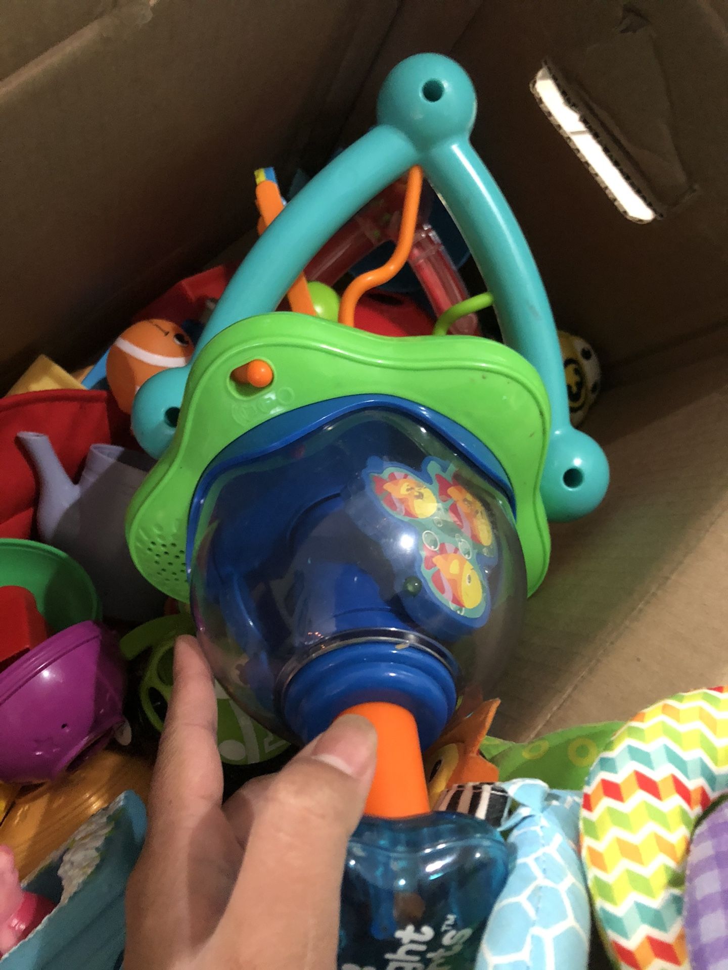 box of baby/toddler toys