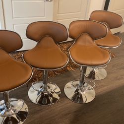 4 Brown WayFair Bar Stools 
