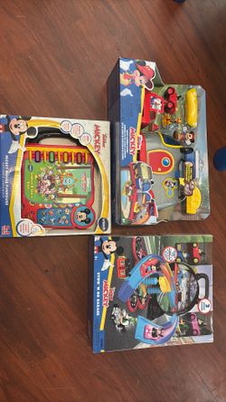 bran new toys still in  box , baby shoes size 7 , baby bath tub , learning table just needs new batteries  Mickey Mouse kid toy box stand