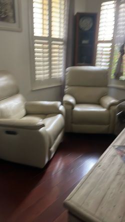 White leather chairs