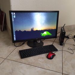 Lenovo ThinkCentre M715q tiny computer with monitor 