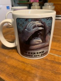 white ceramic mug of an orangutan