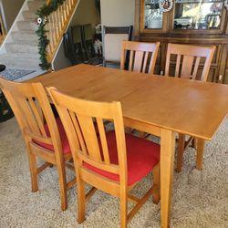 Dining Table And 4 Chairs With Self Storing Leaf!
