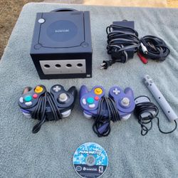 GameCube Nintendo with 3 Controller, racing wheel to play Mario Kart 7 With Game, all Cables, Game Cube Blue or black. All work 100% $260! My lowest