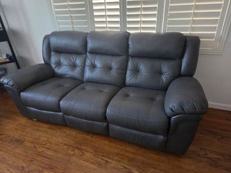 Gray Leather Auto Reclining Sofa Set