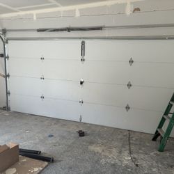 Used 15’7”x 7’ Steel back Insulated Garage Door