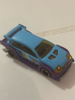 Hot Wheels 2017 Easter Series Flight '03 diecast car, featuring a light blue body, purple fenders, and "Easter" side graphics