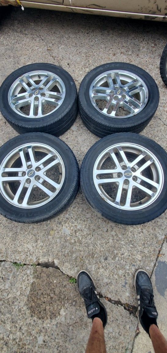16" Rims With Tires ( Not much thread left)