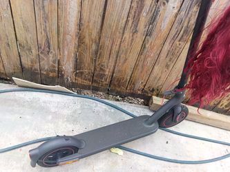 Black Electric Scooter with Red Accents