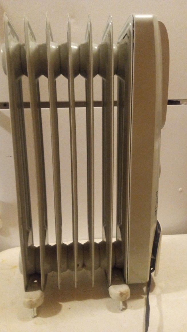 Radiator Heater Works Great No Casters