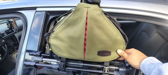 Army green CADeN triangle sling camera bag