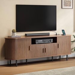 69" Fluted TV Stand with Power Outlet for TVs up to 80 Inch, Entertainment Center with Storage, Sliding Doors, Adjustable Shelves, Mid Century Modern