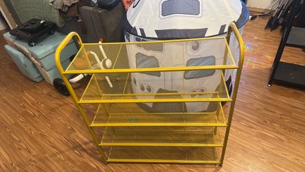 Gold mesh shoe rack