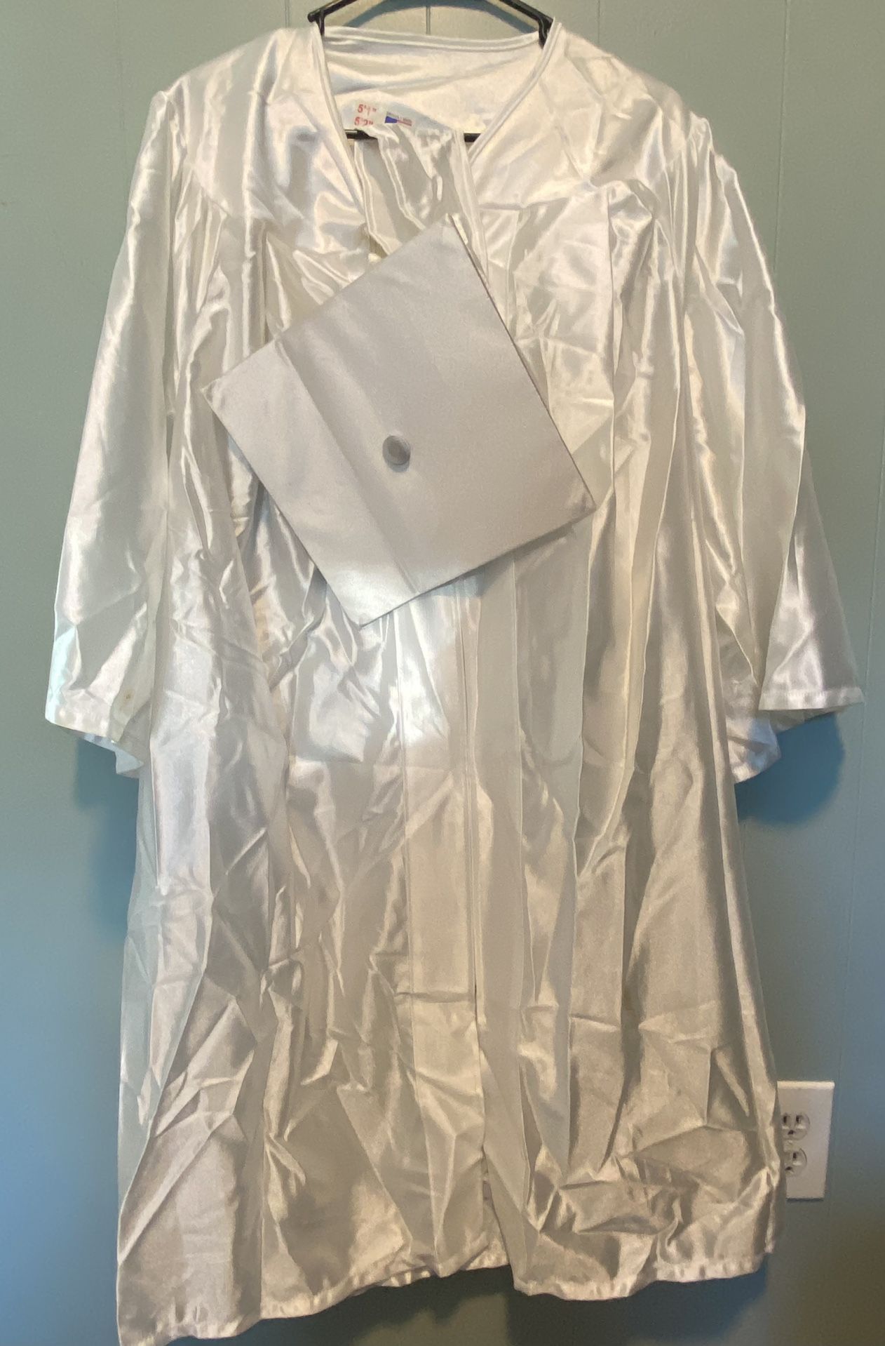 Cap And Gown. $20