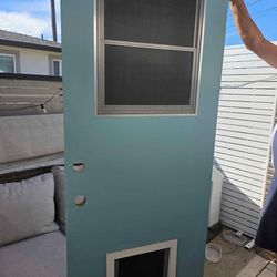 Wood door w/ dog door