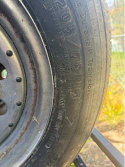 (2) Goodyear205/75/15  trailer tires on chrome 5x4.5 wheels