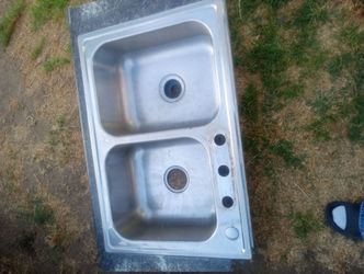 Good  stainless steel sink  22 wide by 33 long