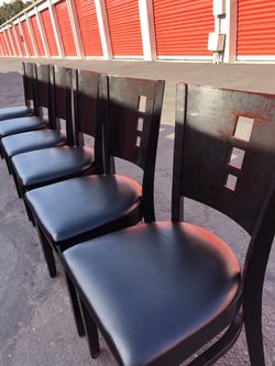 $40 each / $40 cada una/ 6 solid  black wood chairs /6 sillas de madera masizas