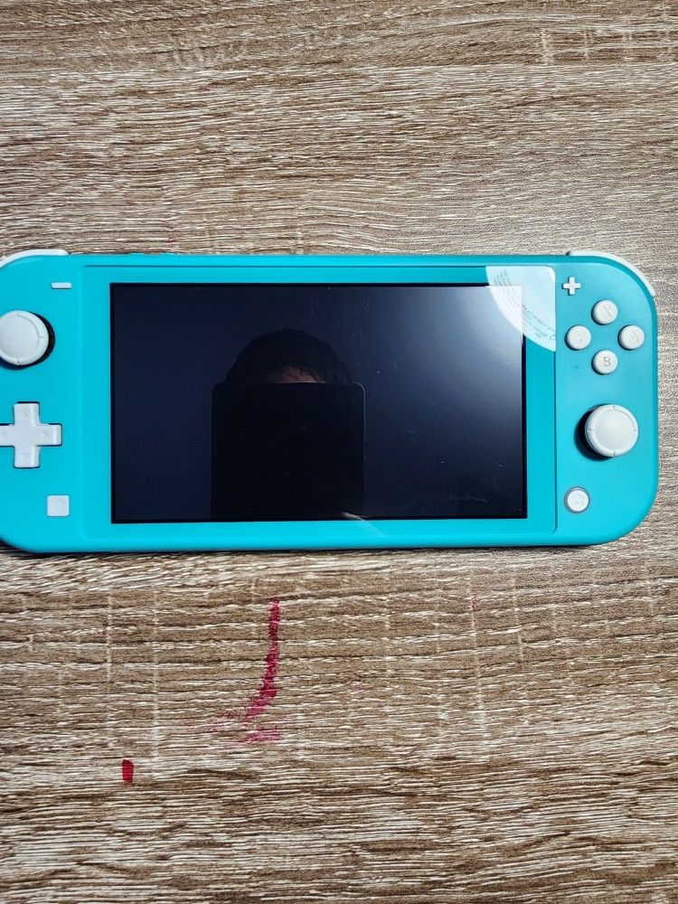 Nintendo Switch Lite with 128gb memory included check desc 