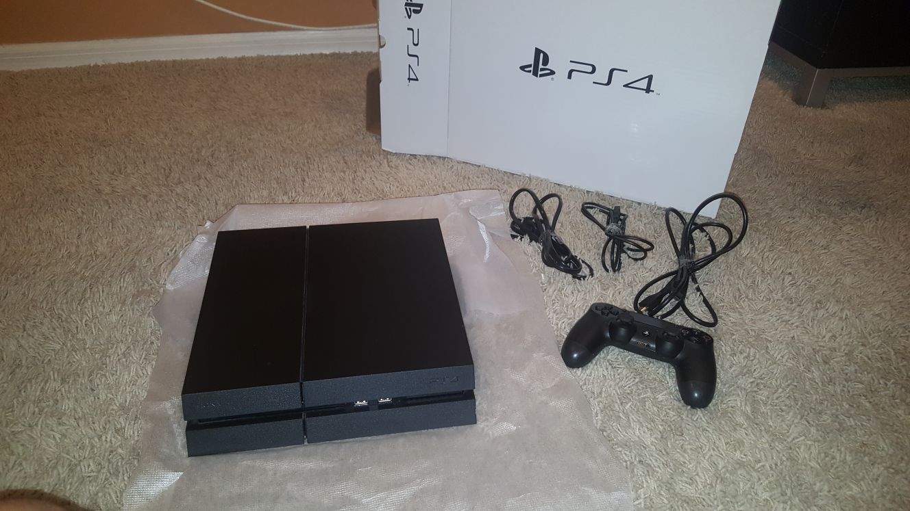 PS4 Console with cables and controller