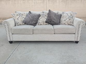Gray Fabric Sofa with Nailhead Trim
