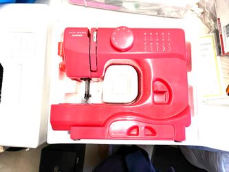 Girls Sewing Machine. Janome Lightning