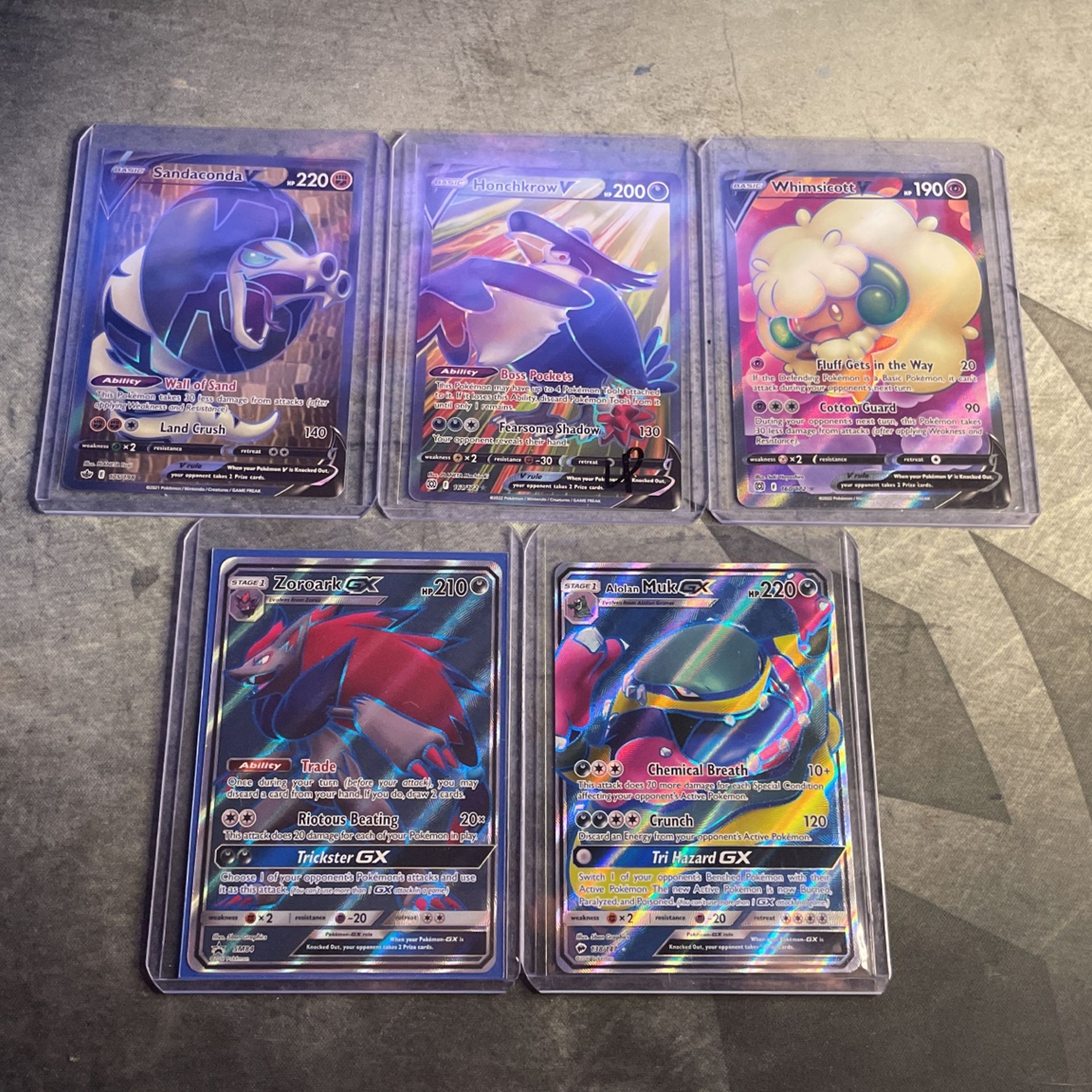 Sandaconda v full art, Galatians muk V full art,  Zoroark V full art, Honchcrow V full art, and Whimsicott V full art