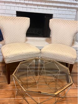 Chairs and glass coffee table