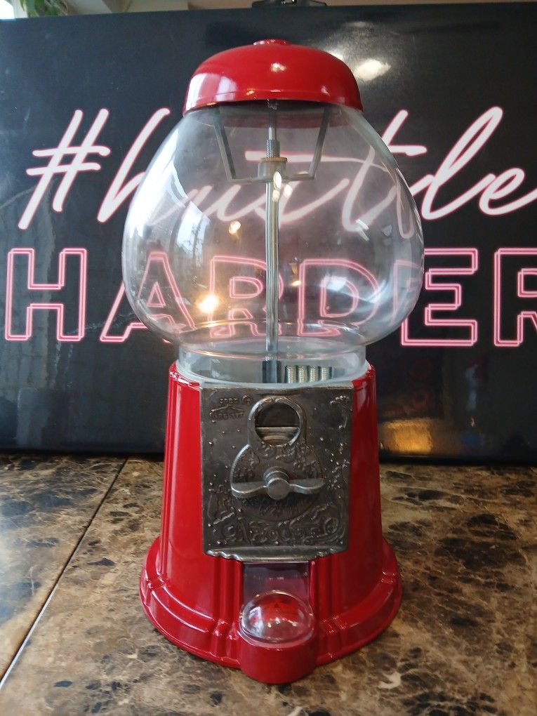 1985 Vintage Red CAROUSEL Gumball Machine Metal W/ Glass Globe WORKS 15inch
This 1985 Vintage Red Carousel Gumball Machine is a classic piece of nos