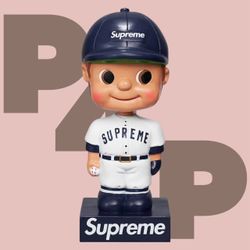 Supreme Bobblehead Figure