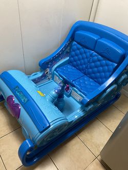 Disney Frozen Sleigh 12-Volt Battery Powered Ride-On for your little Elsa and Anna - Hours of Fun!