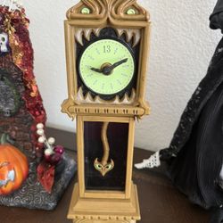Disney haunted mansion clock