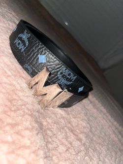 MCM black leather belt with blue diamond