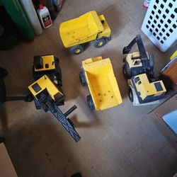 collection of three vintage Tonka "Mighty Diesel" construction vehicles