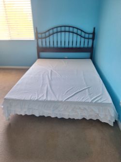 Queen bed with night stand