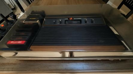 Atari 2600 Working System and Games Variety of games and controllers with console in an organizer with lid. Everything in this lot works great! All ga