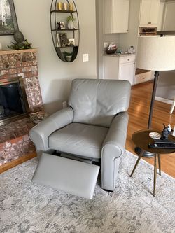 Macy’s grey leather recliner