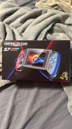 Portable handheld with preloaded games