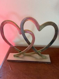 2 HEARTS, gold 15 1/2"w x 3 1/4"d x 15 1/4"tall; cross streets are Arapaho & Waterview