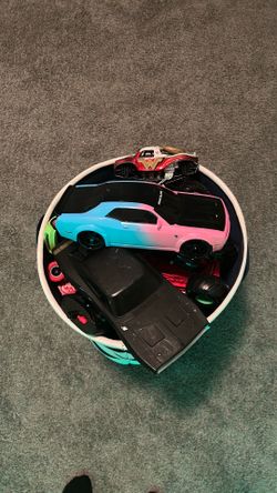 A buckets, full of toys, cars for 75$ OBO